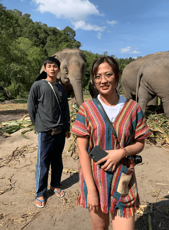 Yehey with elephant sanctuary caretaker