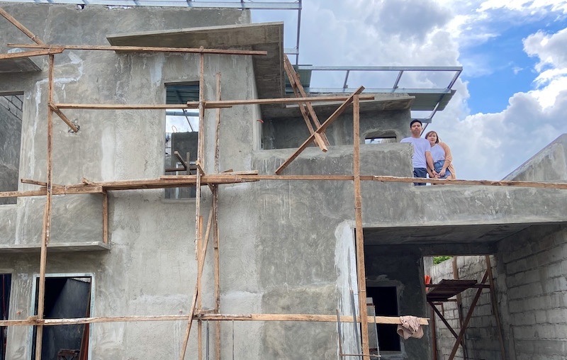 AJ and Kwe in our balcony (house under construction)