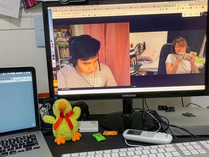 AJ and Kwe on a video call