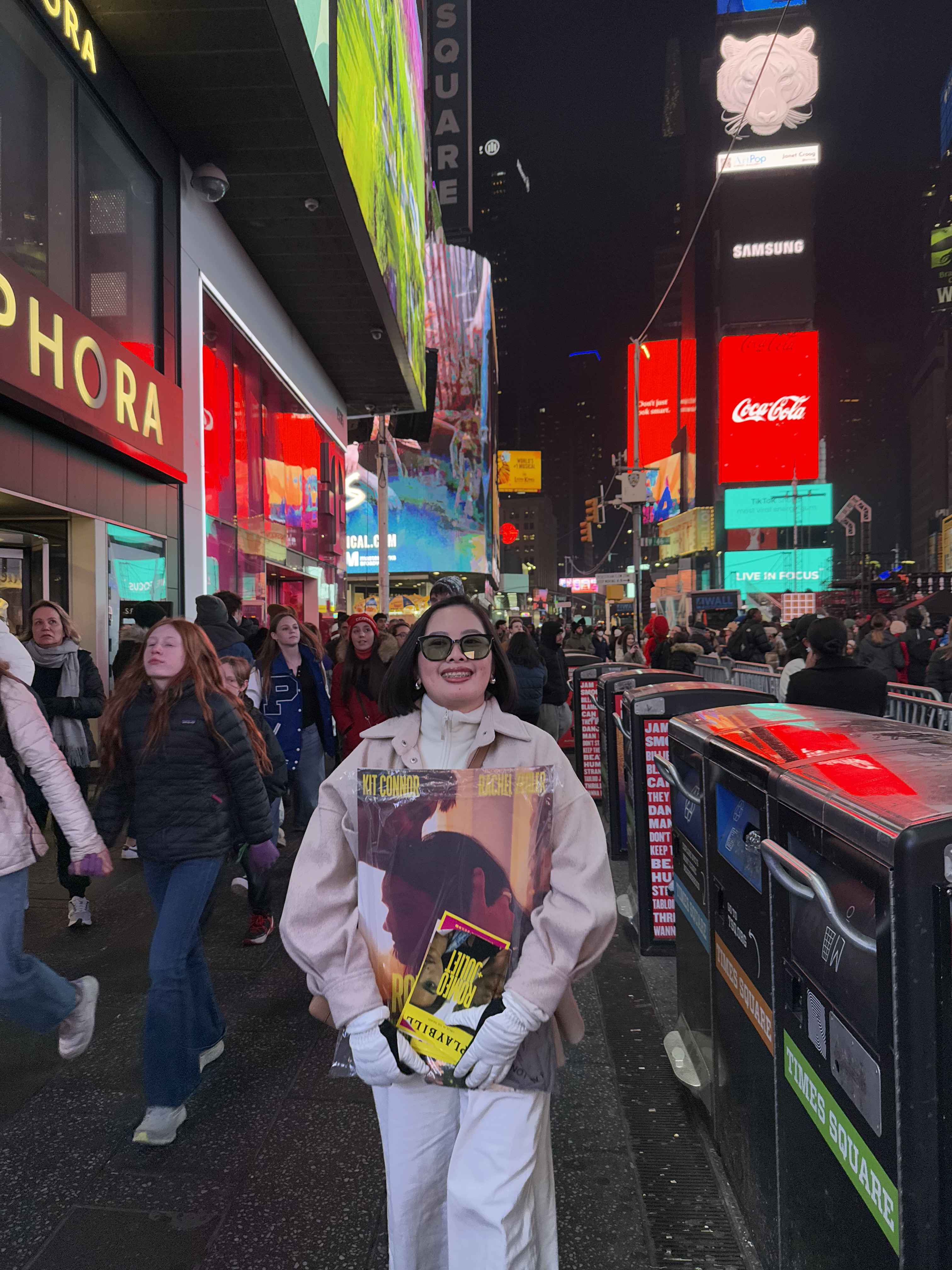 Kwe at Times Square with Romeo and Juliet merch