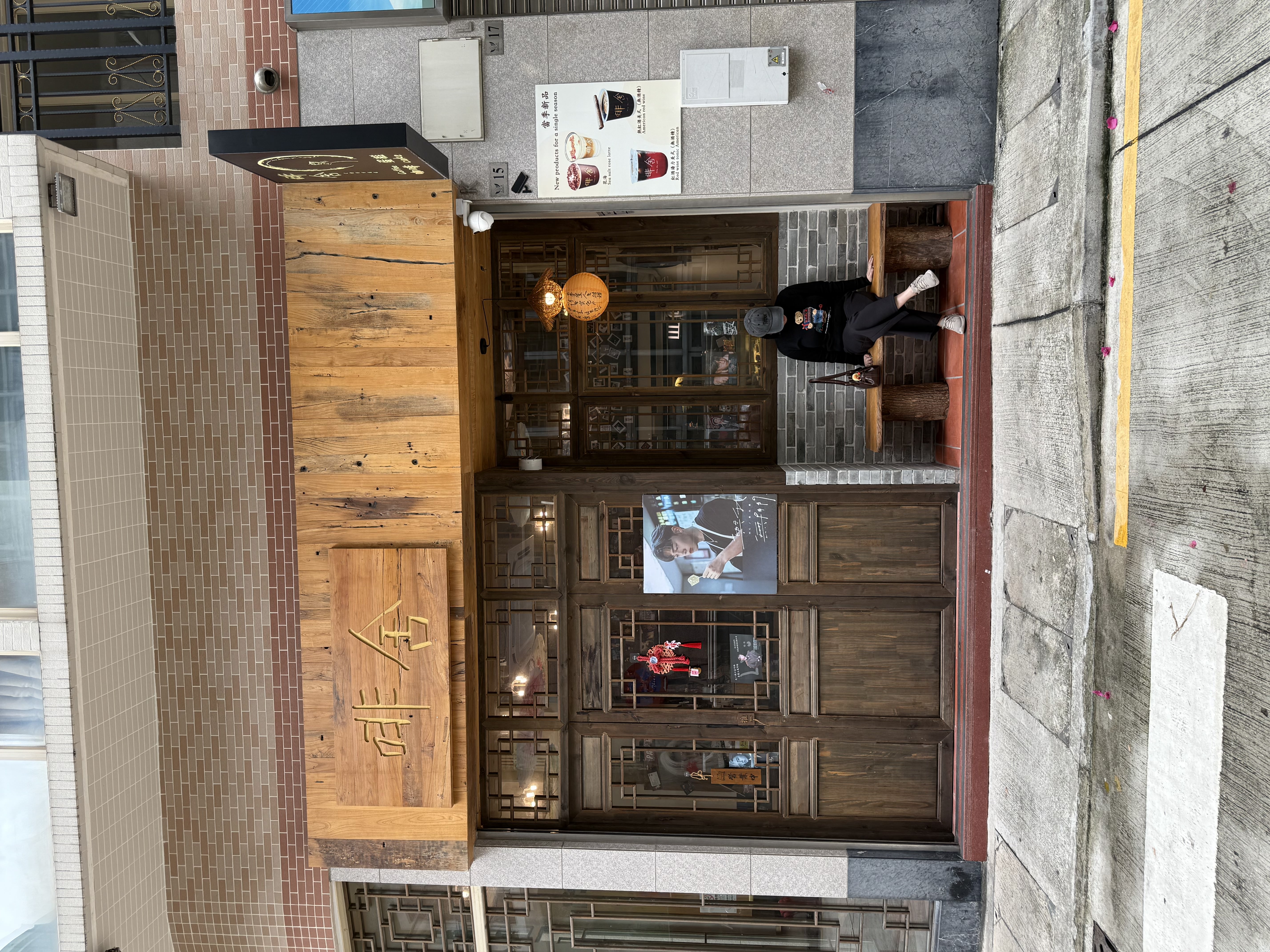 Kwe outside a cafe in Macau