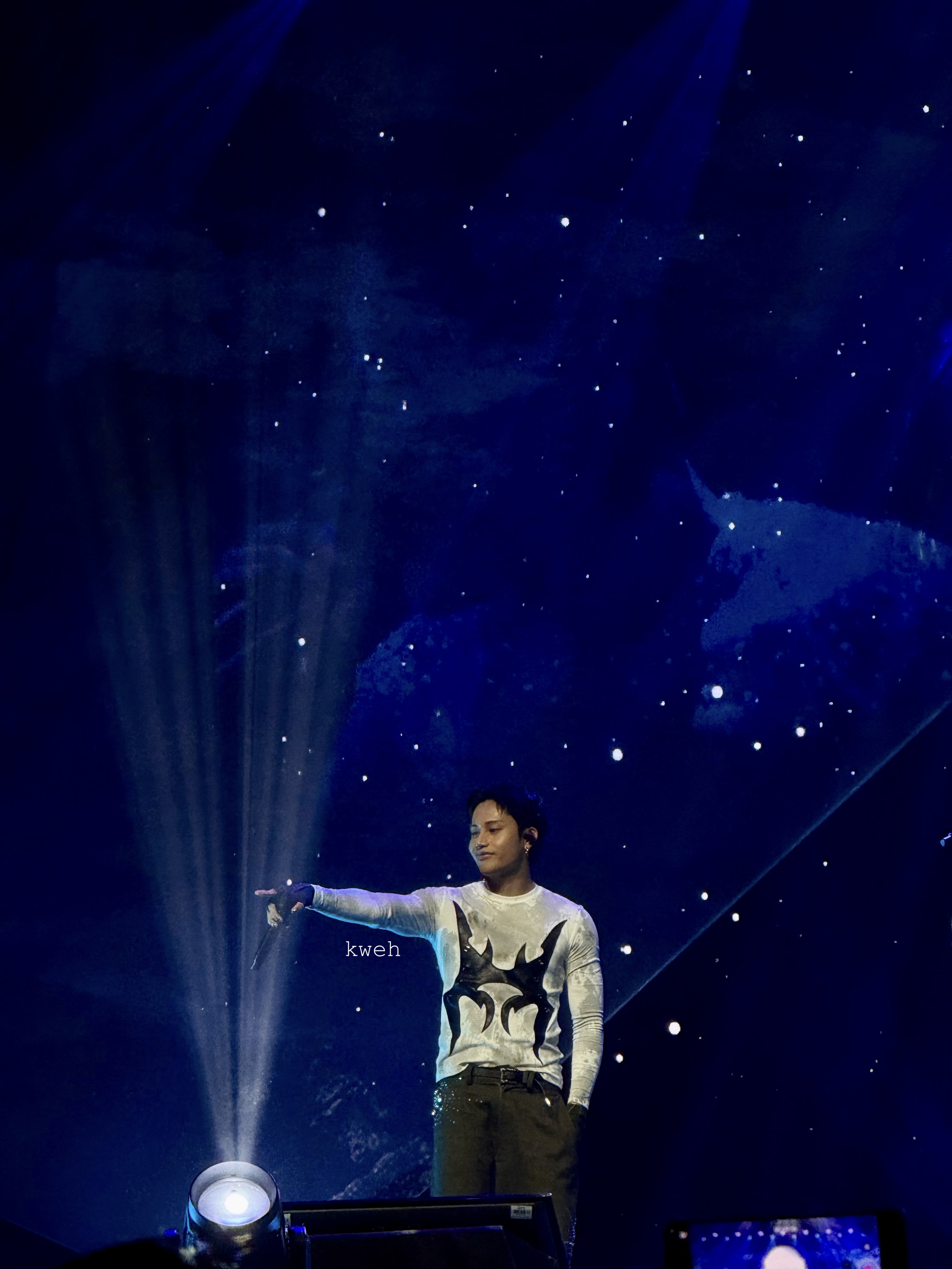 Ken pointing to a fan