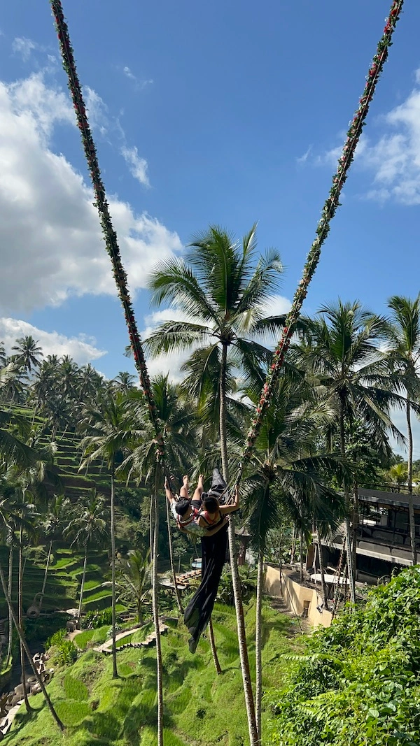 Kwe and AJ at a giant swing in Alas Harum Bali