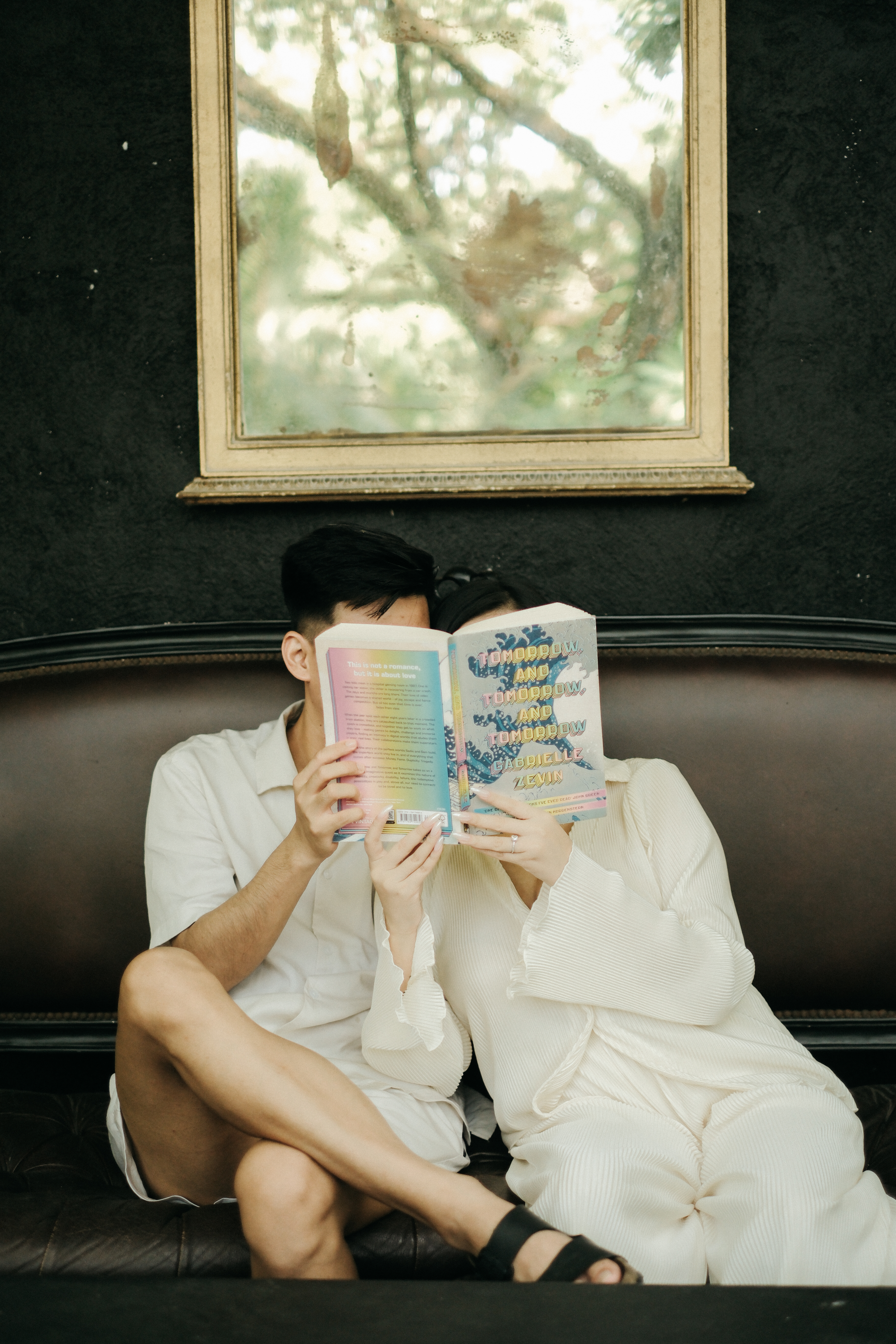 aj and kwe with a book